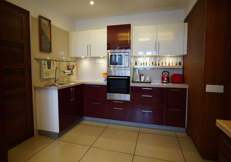 What are some clever space-saving ideas for small kitchen interiors?